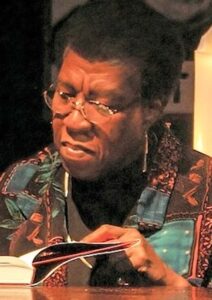 Octavia E. Butler signing a book
