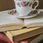 teacup and books by anete lusina