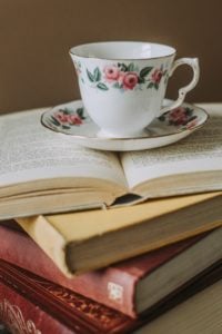 teacup and books by anete lusina