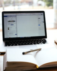 Desk, coffee, and laptop by nick morrison