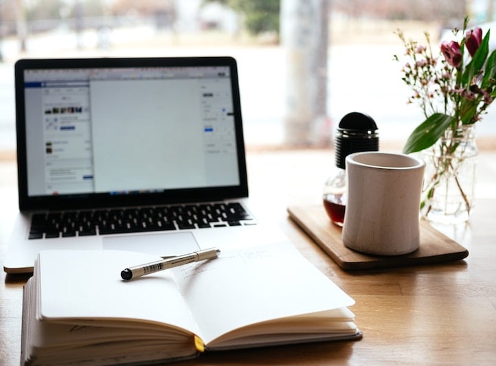 Desk, coffee, and laptop photo by nick morrison