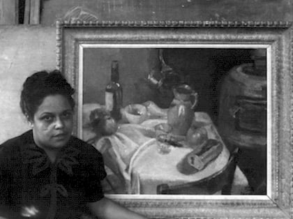 Gwendolyn B. Bennett with one of her paintings