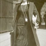 Jessie Tarbox Beals walking a city street